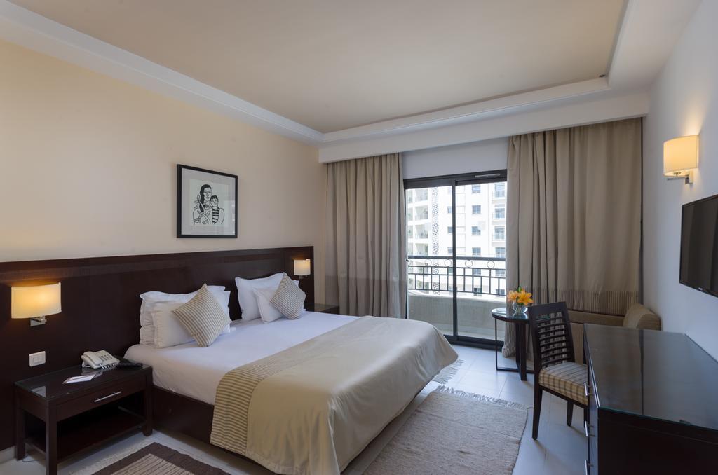 Le Corail Suites Hotel Tunisi Esterno foto